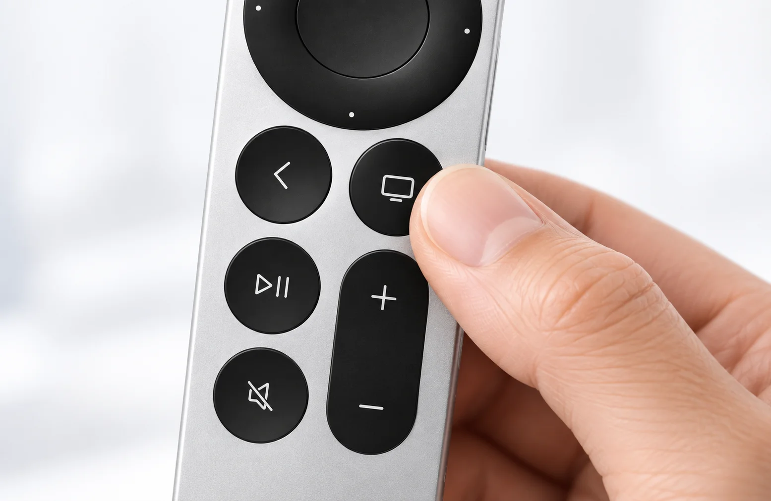 Illustration of a thumb pressing a remote button